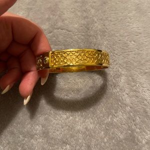 Coach gold bracelet.